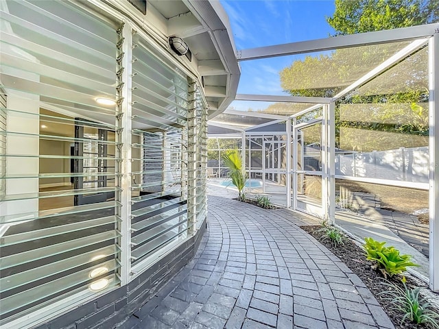 905 W 11th Ave, Mount Dora, FL 32757 - view of home's exterior featuring a patio area, glass enclosure, and a swimming pool