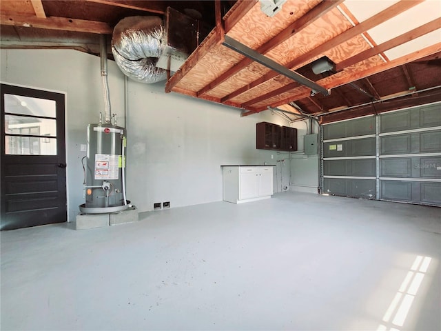 905 W 11th Ave, Mount Dora, FL 32757 - garage with gas water heater and electric panel