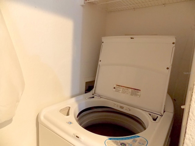 8809 Dunes Ct Unit 201, Kissimmee, FL 34747 - laundry area featuring hookup for a washing machine
