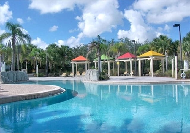 8809 Dunes Ct Unit 201, Kissimmee, FL 34747 - community pool featuring a gazebo