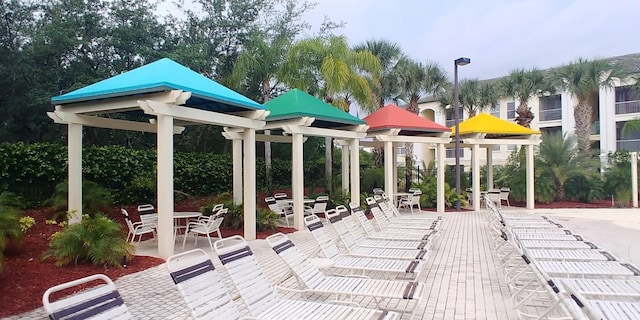 8809 Dunes Ct Unit 201, Kissimmee, FL 34747 - view of patio featuring outdoor dining space