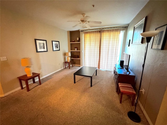 8809 Dunes Ct Unit 201, Kissimmee, FL 34747 - office area with a ceiling fan, carpet flooring, baseboards, and built in features