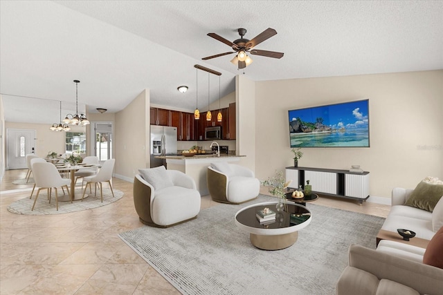 1208 Roma Ct, Orlando, FL 32825 - living area featuring lofted ceiling, baseboards, a textured ceiling, and ceiling fan with notable chandelier