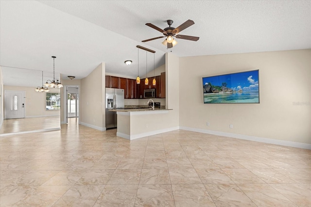 1208 Roma Ct, Orlando, FL 32825 - unfurnished living room with vaulted ceiling, a sink, ceiling fan with notable chandelier, marble finish floor, and baseboards