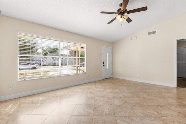 1208 Roma Ct, Orlando, FL 32825 - empty room featuring plenty of natural light, a textured ceiling, lofted ceiling, and ceiling fan