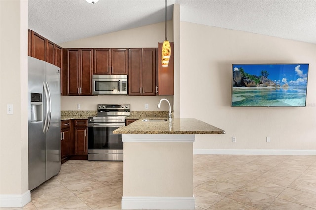 1208 Roma Ct, Orlando, FL 32825 - kitchen with vaulted ceiling, a sink, a textured ceiling, a peninsula, and appliances with stainless steel finishes