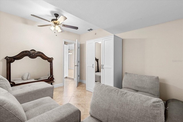 1208 Roma Ct, Orlando, FL 32825 - living area featuring visible vents, marble finish floor, baseboards, and ceiling fan