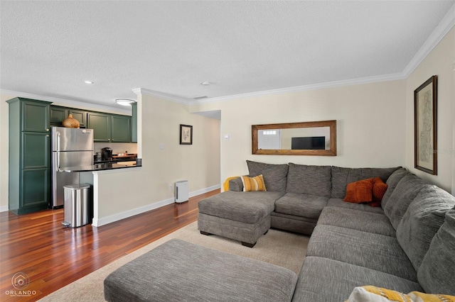 4820 Conway Rd Unit 130, Orlando, FL 32812 - living area featuring ornamental molding, dark wood-style floors, a textured ceiling, baseboards, and recessed lighting