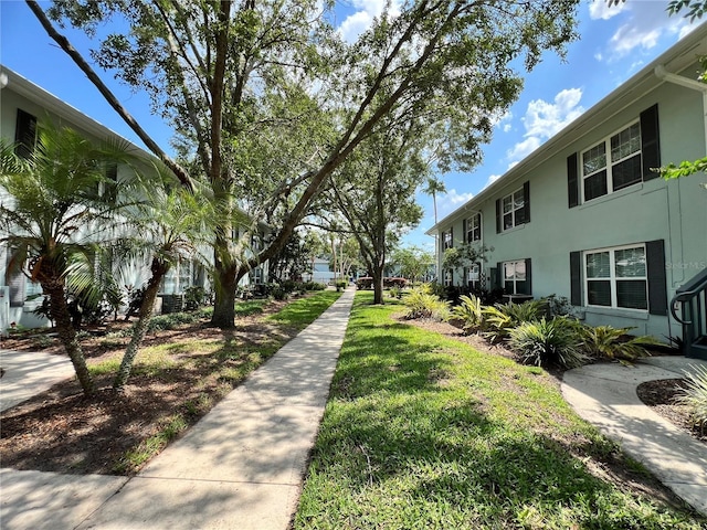 4820 Conway Rd Unit 130, Orlando, FL 32812 - surrounding community featuring a lawn
