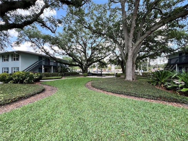 4820 Conway Rd Unit 130, Orlando, FL 32812 - view of grassy yard with stairs
