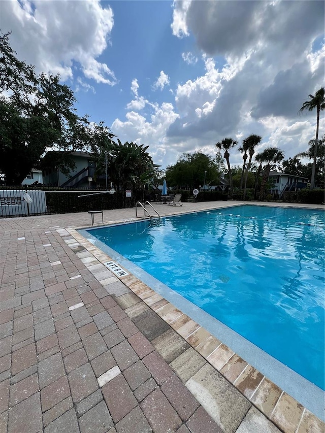 4820 Conway Rd Unit 130, Orlando, FL 32812 - community pool featuring a patio area