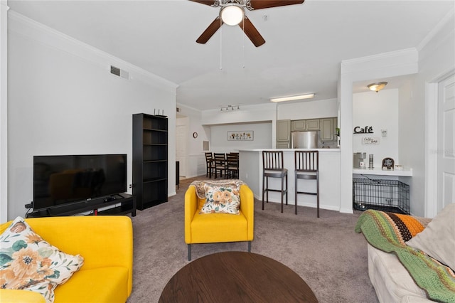 3344 Corona Village Way Unit 207, Orlando, FL 32835 - living area with crown molding, carpet floors, and a ceiling fan