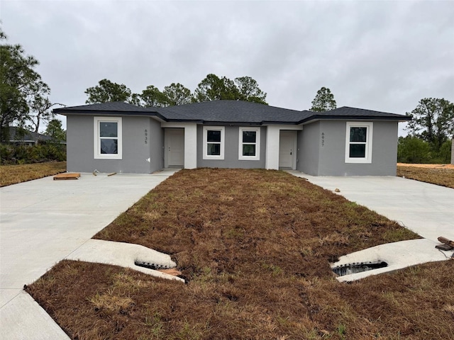 6935 Dickinson Dr, Sebring, FL 33872 - ranch-style home featuring concrete driveway and stucco siding