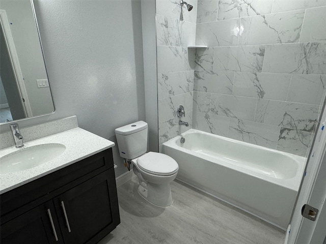 6935 Dickinson Dr, Sebring, FL 33872 - full bathroom featuring wood finished floors, a textured wall, toilet, vanity, and  shower combination
