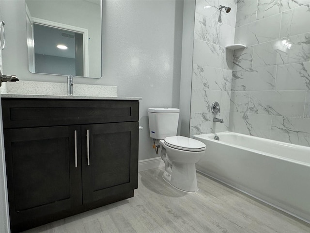 6935 Dickinson Dr, Sebring, FL 33872 - full bathroom with wood finished floors, vanity, shower / washtub combination, baseboards, and toilet