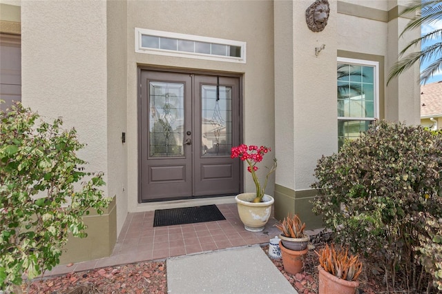 2005 Pitch Way, Kissimmee, FL 34746 - entrance to property featuring french doors and stucco siding