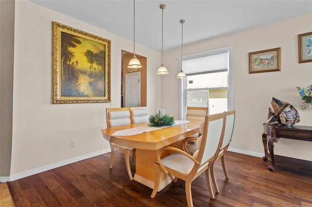 2005 Pitch Way, Kissimmee, FL 34746 - dining space with baseboards and dark wood-style flooring