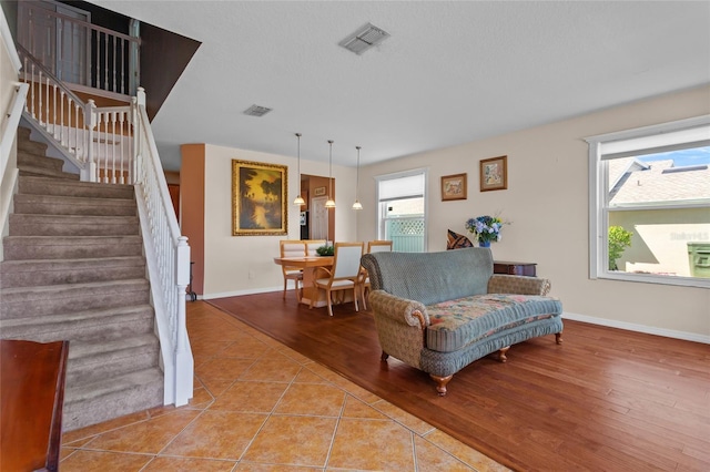 2005 Pitch Way, Kissimmee, FL 34746 - sitting room featuring baseboards, stairs, and visible vents