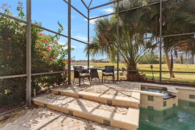 2005 Pitch Way, Kissimmee, FL 34746 - view of patio / terrace with a water view, glass enclosure, an in ground hot tub, and an outdoor pool