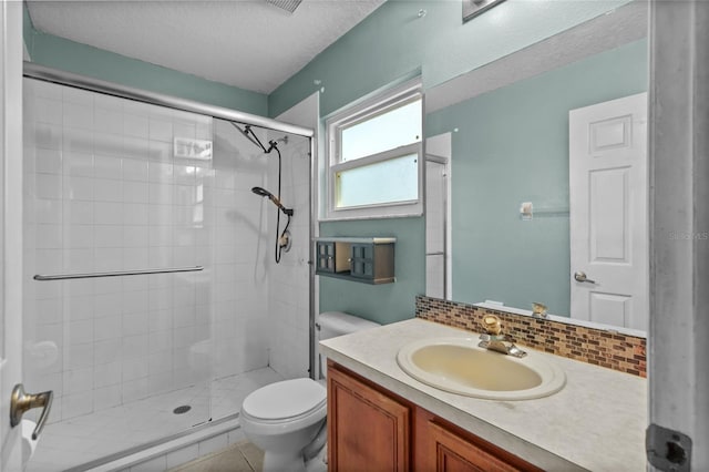 2005 Pitch Way, Kissimmee, FL 34746 - full bath featuring vanity, a textured ceiling, toilet, and a shower stall