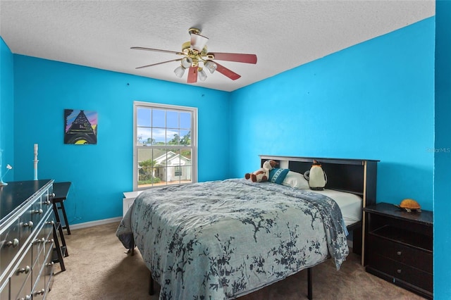 2005 Pitch Way, Kissimmee, FL 34746 - bedroom with a textured ceiling, ceiling fan, baseboards, and carpet