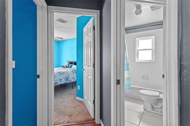 2005 Pitch Way, Kissimmee, FL 34746 - full bath featuring visible vents, shower / tub combo with curtain, a textured ceiling, and toilet