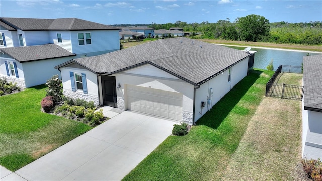 view of front of property with fence, stucco siding, an attached garage, and stone siding