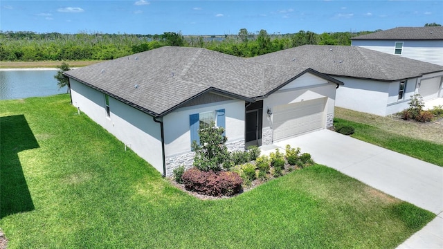 view of front of property with stucco siding, a shingled roof, a garage, driveway, and stone siding