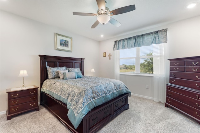 bedroom with light colored carpet, ceiling fan, recessed lighting, and baseboards