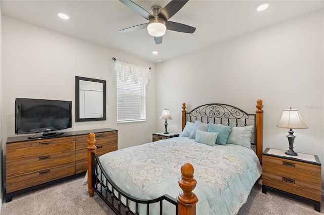 bedroom with recessed lighting, a ceiling fan, and light colored carpet
