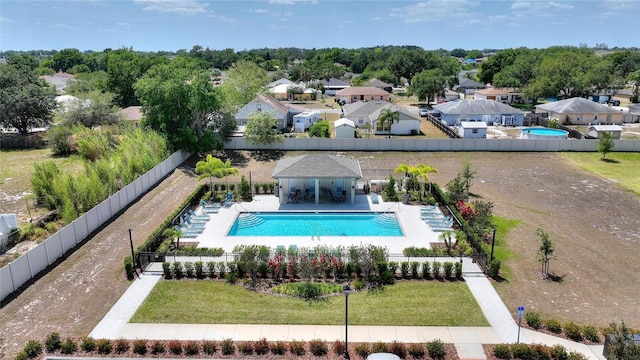 birds eye view of property with a residential view