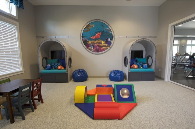 16043 Scarpetta St, Winter Garden, FL 34787 - game room with carpet and plenty of natural light
