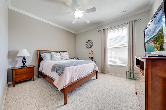 bedroom with baseboards, ornamental molding, light colored carpet, and ceiling fan