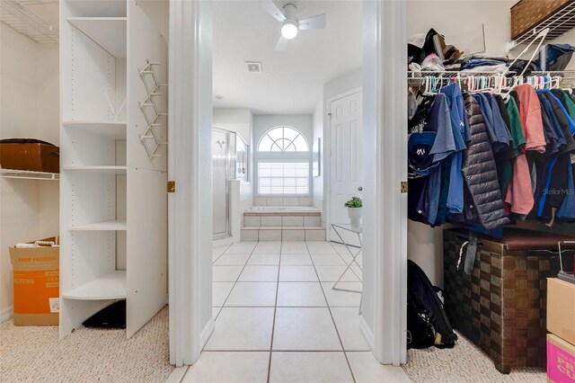 spacious closet with tile patterned flooring