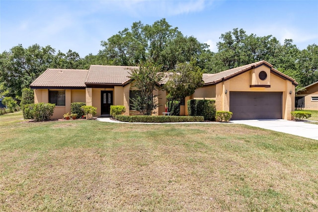 ranch-style home featuring a garage, stucco siding, a tiled roof, and driveway