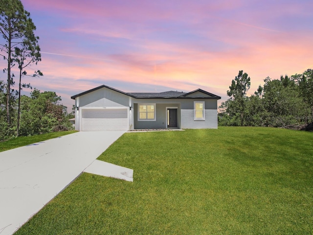 7744 Sun N Lake Blvd, Sebring, FL 33872 - ranch-style home with an attached garage, a lawn, stucco siding, and concrete driveway