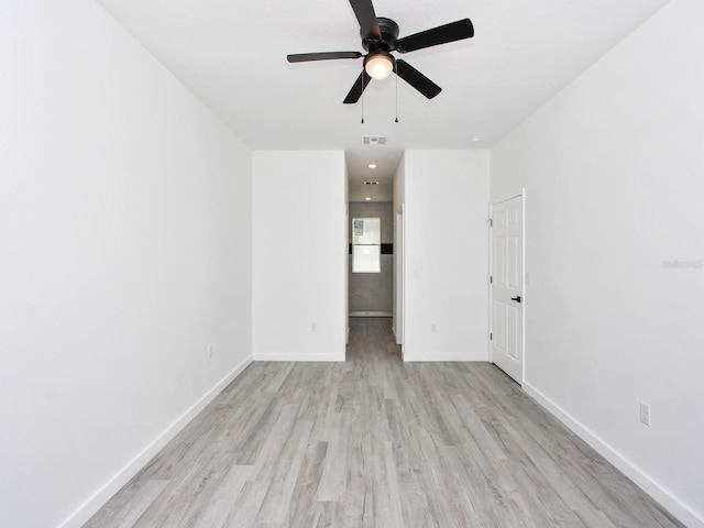 7744 Sun N Lake Blvd, Sebring, FL 33872 - interior space with light wood-type flooring, visible vents, a ceiling fan, and baseboards