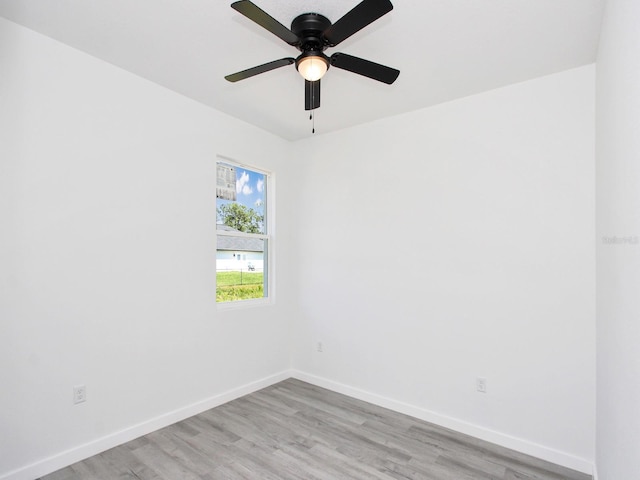 7744 Sun N Lake Blvd, Sebring, FL 33872 - unfurnished room featuring a ceiling fan, baseboards, and light wood-style floors