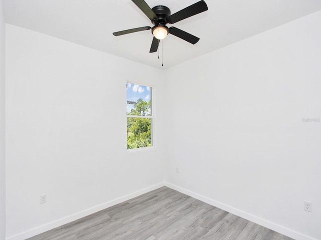 7744 Sun N Lake Blvd, Sebring, FL 33872 - spare room with light wood-style flooring, baseboards, and ceiling fan