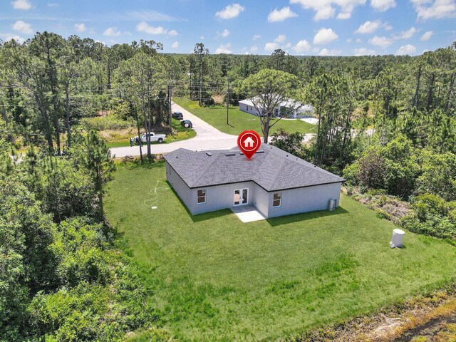 7744 Sun N Lake Blvd, Sebring, FL 33872 - drone / aerial view featuring a wooded view