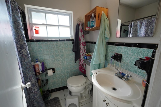 full bathroom with toilet, tile walls, tile patterned flooring, a shower with shower curtain, and vanity