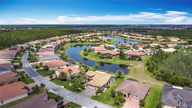 aerial view featuring a water view and a residential view