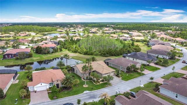 aerial view featuring a residential view and a water view