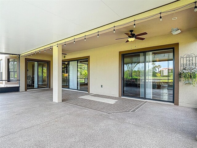 view of patio with ceiling fan