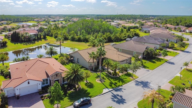 aerial view with a water view and a residential view