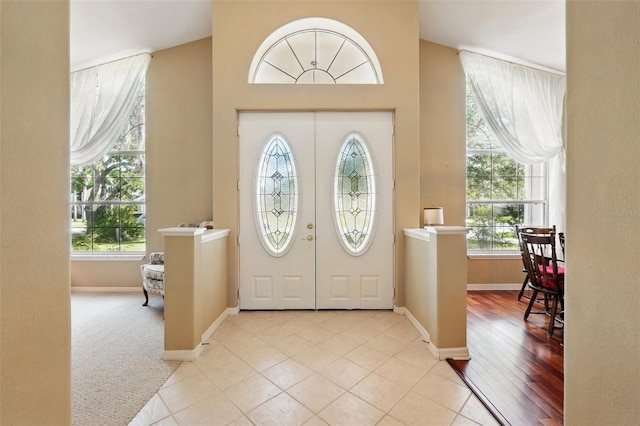 2374 Eagle Trace Dr, Kissimmee, FL 34746 - foyer with light tile patterned flooring and baseboards