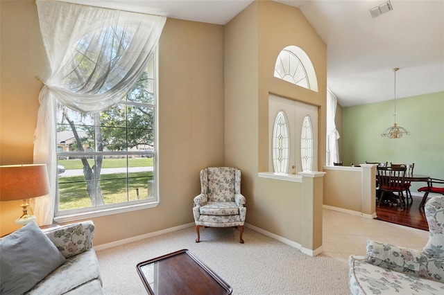 2374 Eagle Trace Dr, Kissimmee, FL 34746 - living area featuring baseboards, visible vents, carpet, and plenty of natural light