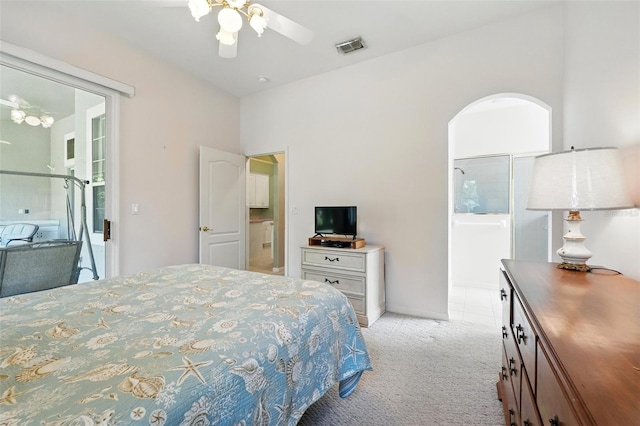 2374 Eagle Trace Dr, Kissimmee, FL 34746 - bedroom with visible vents, ensuite bathroom, a ceiling fan, and carpet flooring