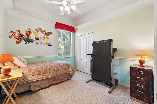 2374 Eagle Trace Dr, Kissimmee, FL 34746 - bedroom with a closet, crown molding, a ceiling fan, carpet, and baseboards