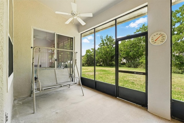 2374 Eagle Trace Dr, Kissimmee, FL 34746 - unfurnished sunroom with a wealth of natural light and ceiling fan